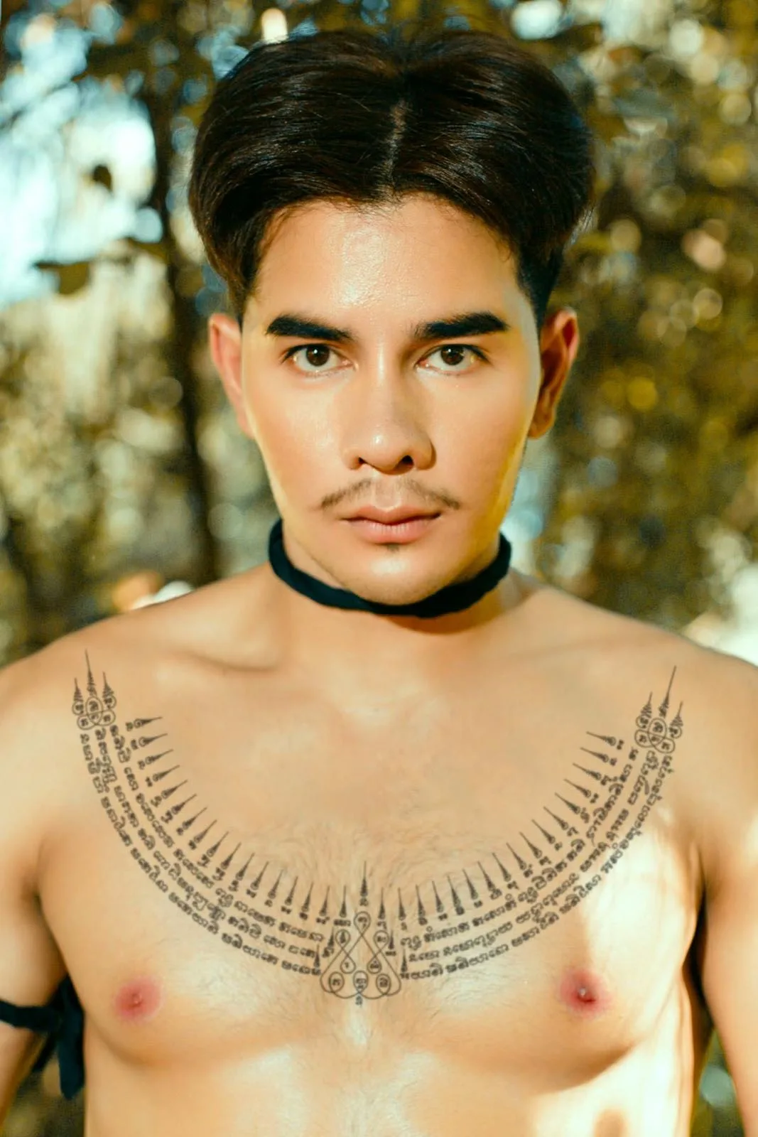 Sak Yant tattoo close-up, traditional Thai sacred ink